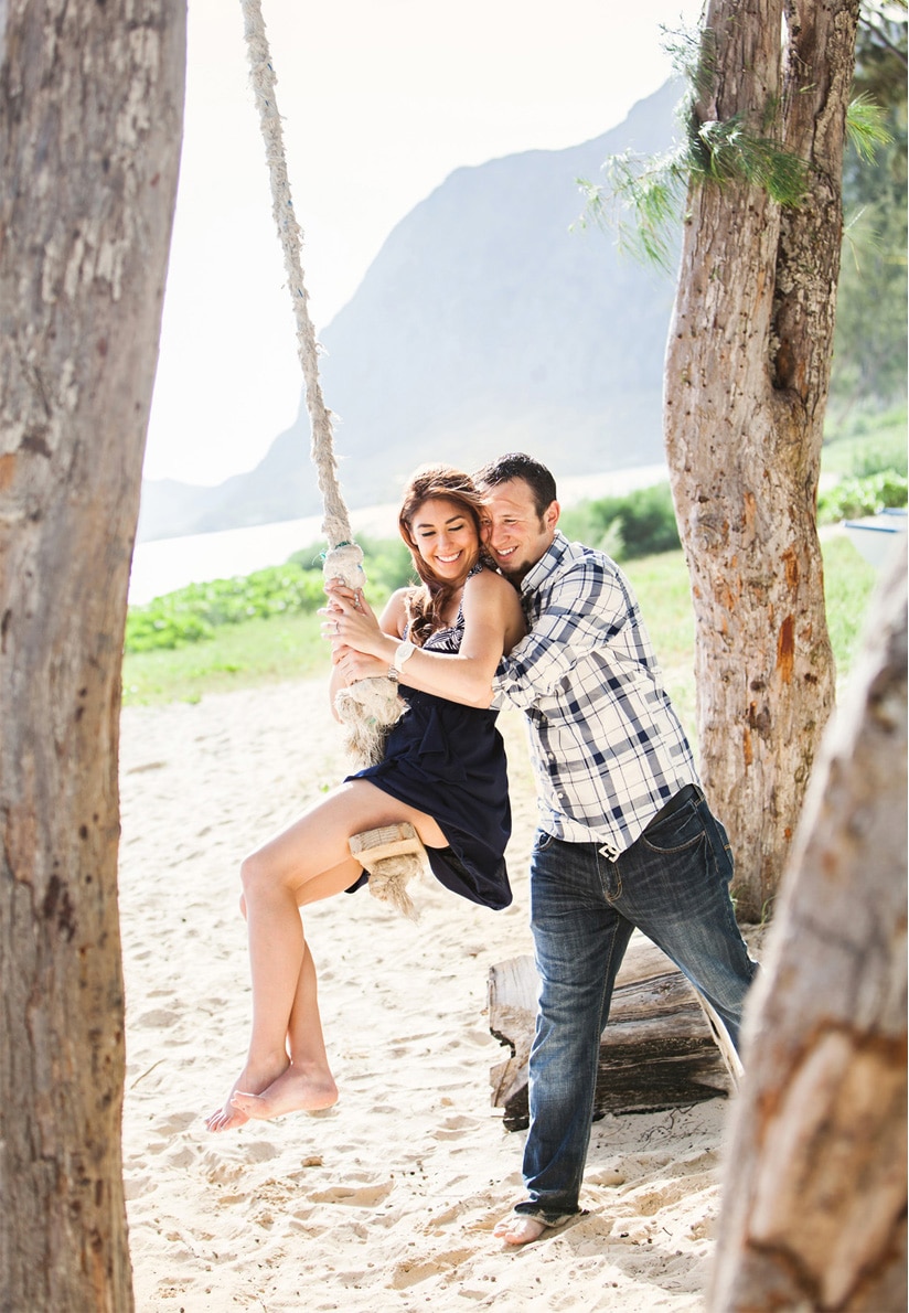 Photography of a surprise wedding proposal at Waimanalo Beach in Hawaii