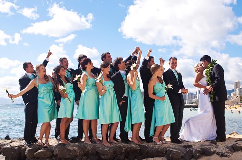 Photography from a Hawaii destination wedding. Church wedding ceremony and reception at the Outrigger Canoe Club in Waikiki.